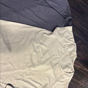 Lululemon Athletica Short Sleeve Black and Light Mint Tees